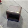 Image 1 : ROLLING LEATHERETTE TOP STORAGE OTTOMAN