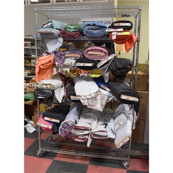 FOUR SHELVES OF FABRIC BOLTS - ASSORTED PATTERNS
