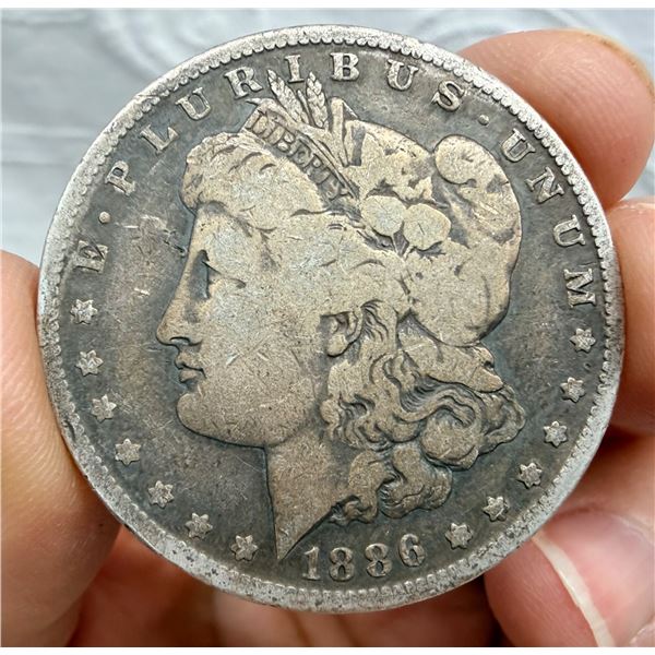 MORGAN SILVER DOLLAR - 1886O
