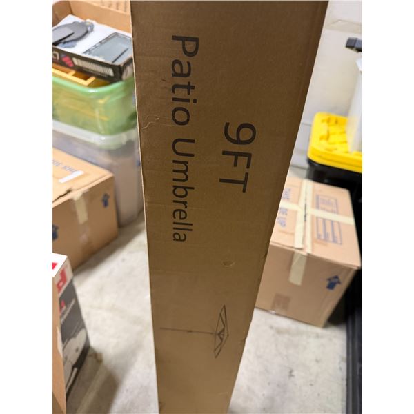 9 foot Patio Umbrella box says red