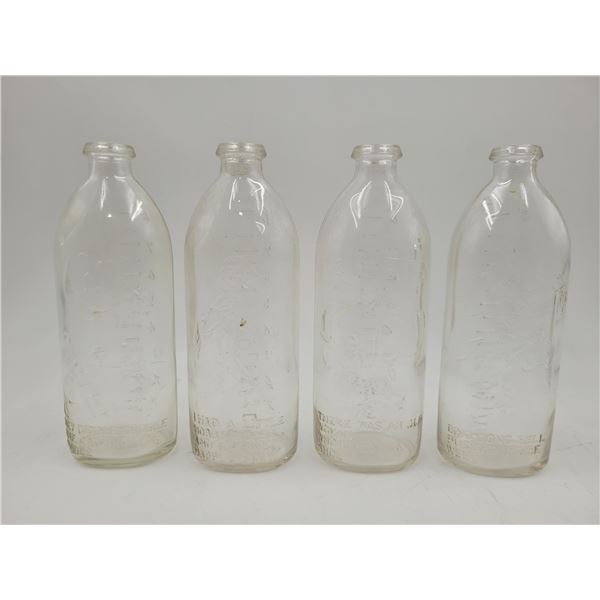 4 Vintage Embossed Glass Milk Bottles