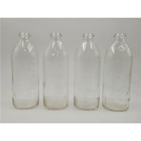 4 Vintage Embossed Glass Milk Bottles