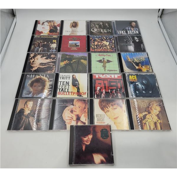 Assorted Vintage CDs: Supertramp, Queen, Luke Bryan, Motley Crue, & More