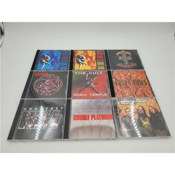 9 Vintage CDs: Kiss, The Cult, Guns & Roses, & More