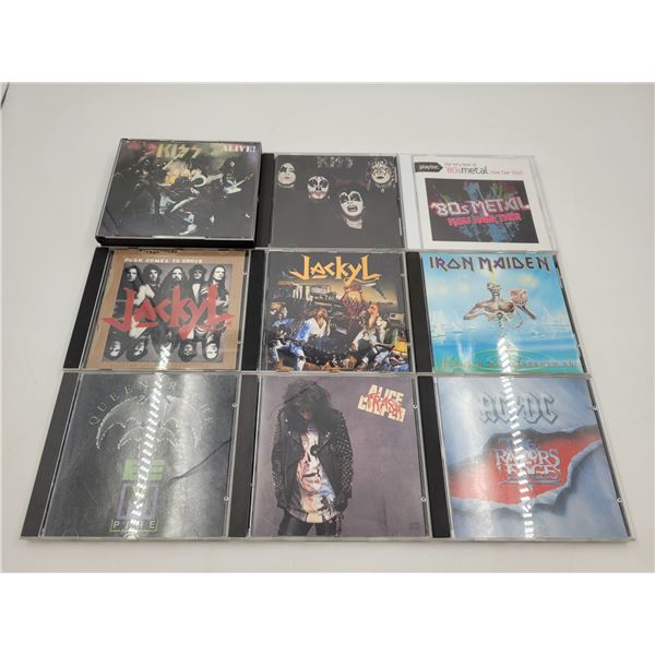 9 Vintage CDs: Alice Cooper, ACDC, Kiss, Iron Maiden, & More