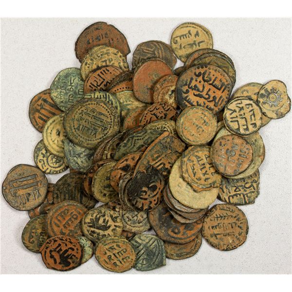 MEDIEVAL ISLAMIC: LOT of 76 medieval copper fulus