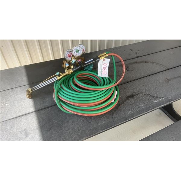 BLUE SHIELD CUTTING TORCH ONE YEAR OLD W/ 50' HOSE AND OXYGEN AND ACETYLENE REGULATORS ONE YEAR OLD