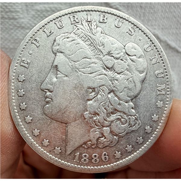 MORGAN SILVER DOLLAR - 1886O