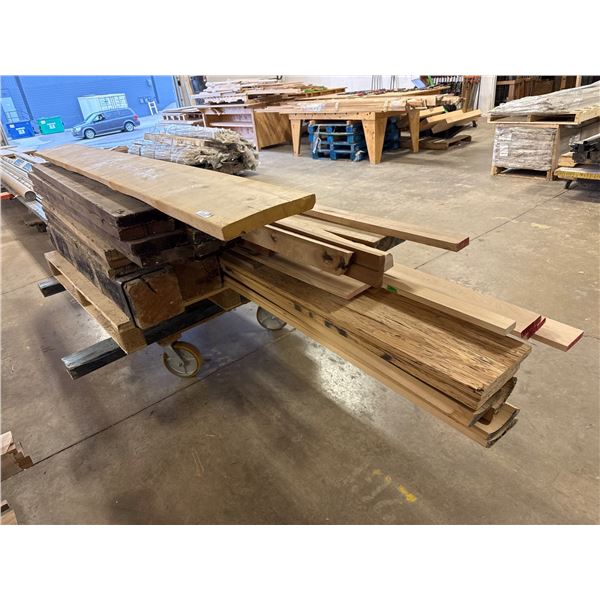 Hardwood and Softwood Lumber Boards on Rolling Platform
