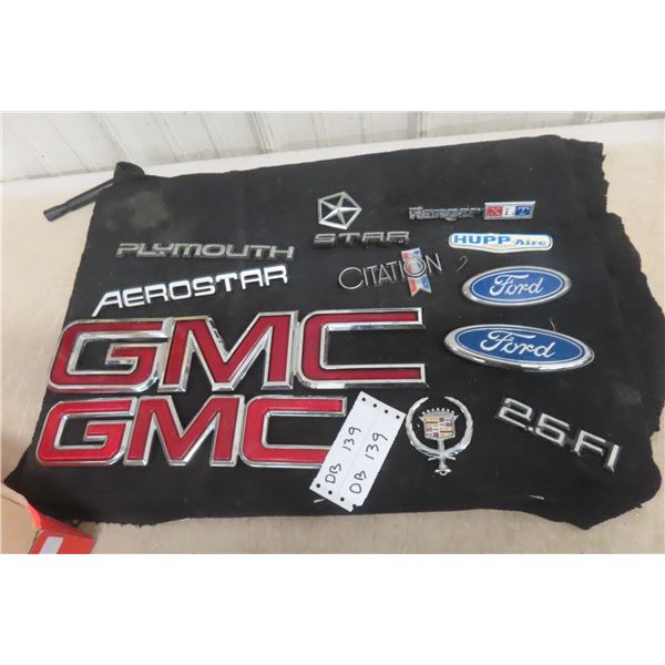 Auto Emblems Including GMC, Ford, and Plymouth