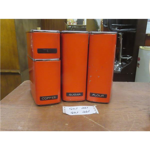 Four Piece Vintage Metal Canister Set In Burnt Orange
