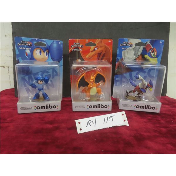 Three Factory Sealed Amiibo Figures: Mega Man, Charizard, and Falco