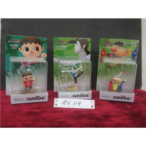 Three Amiibo Figures: Villager, Olimar, and Wii Fit Trainer