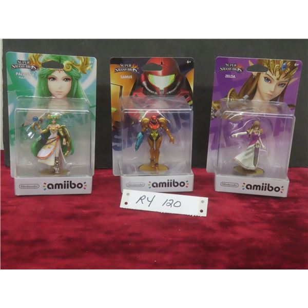 Three Amiibo Figures: Palutena, Samus, and Zelda