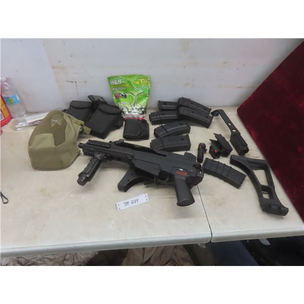 Airsoft Rifle With Seven Magazines, Case, Mask, and Accessories