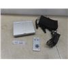 Image 1 : Portable Polaroid DVD Player With Case and Remote