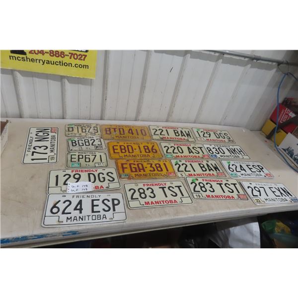 Eighteen Manitoba License Plates