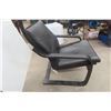 Image 4 : Leather or Leather-Style Chair.