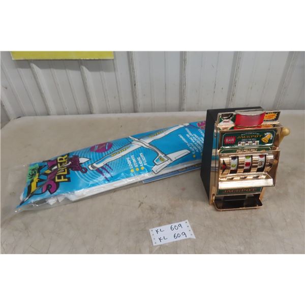Sky Flyer Glider and Golden Jackpot Slot Machine.