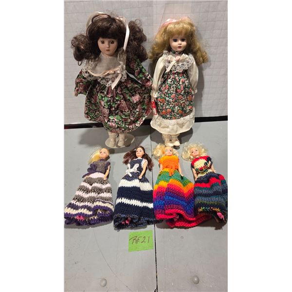 Two 15 Inch Porcelain Dolls, 1 On Stand, Four 11 Inch Dolls With Hand Made Dresses