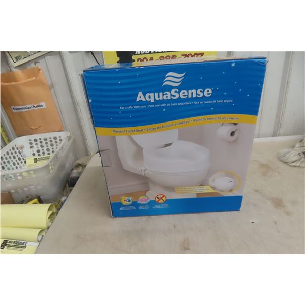 AquaSense Raised Toilet Seat.