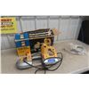 Image 1 : Variable-Speed Portable Band Saw With 4 New Spare Blades.
