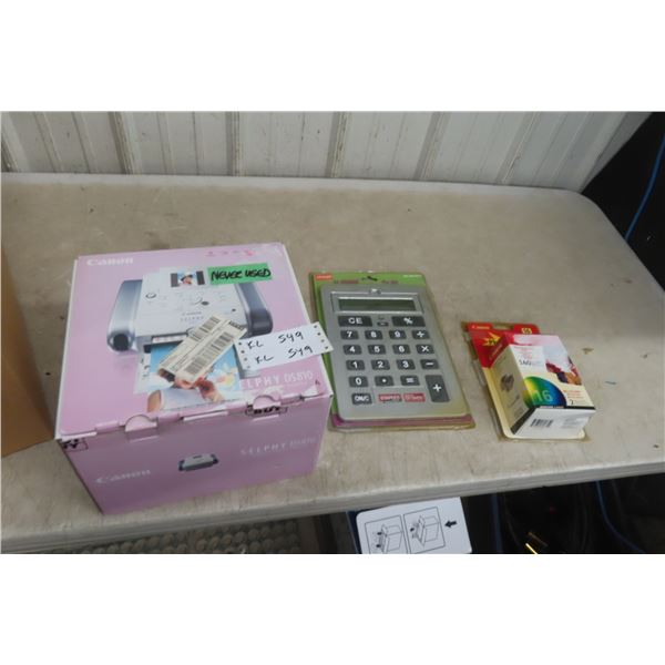 Canon Selphy DS80 Compact Photo Printer With Photo Paper and Calculator.