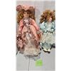 Image 2 : One Seymour Mann 16" Collector’s Porcelain Doll with Stand and One 16" Emerald Porcelain Doll.
