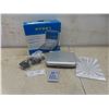 Image 1 : Dynex 7 Inch Portable DVD Player With Remote And Manual