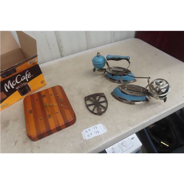 2 Coleman Gas Irons with Rests and Butcher Block Style Clock