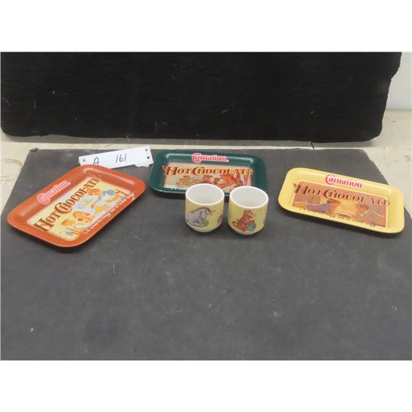 2 Royal Doulton Winnie the Pooh Cups and 3 Carnation Hot Chocolate Tip Trays