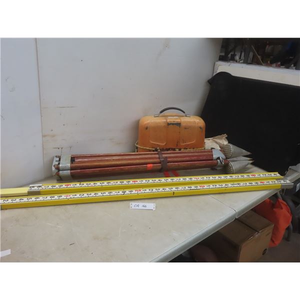 Surveyor’s Transit, Measuring Stick, and Tripod