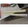 Image 4 : Surveyor’s Transit, Measuring Stick, and Tripod