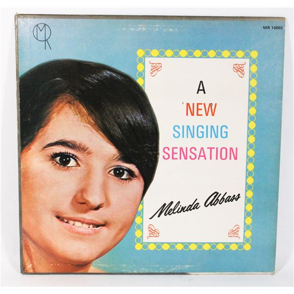 A NEW SINGING SENSATION - MELINDA ABBASS