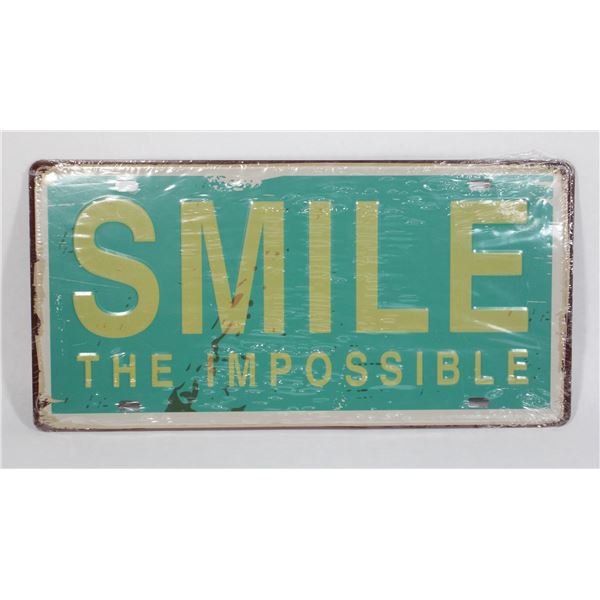 BRAND NEW METAL SMILE THEMED LICENSE PLATE