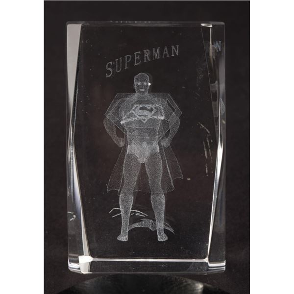 A Superman Laser Etched Glass Paperweight.