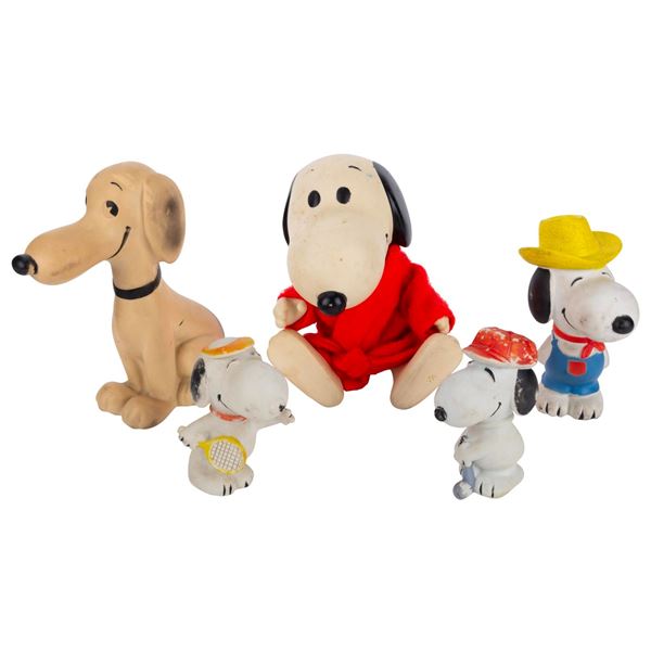 A Collection of Rubber Snoopy Toys.