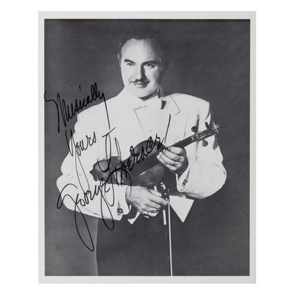 A George Liberace Signed Photo.