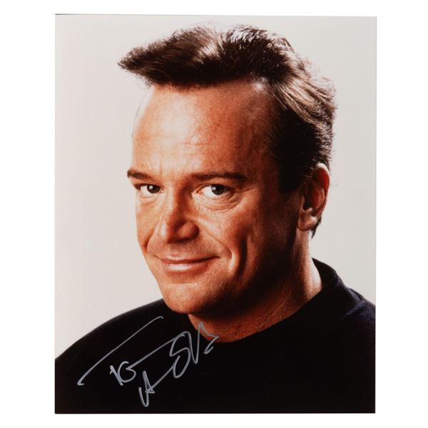 A Signed Tom Arnold Headshot.