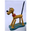 Image 1 : A Fisher Price Pop Up Kritter Pluto Toy.
