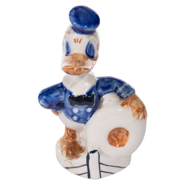 A Ceramic Donald Duck Bud Vase.