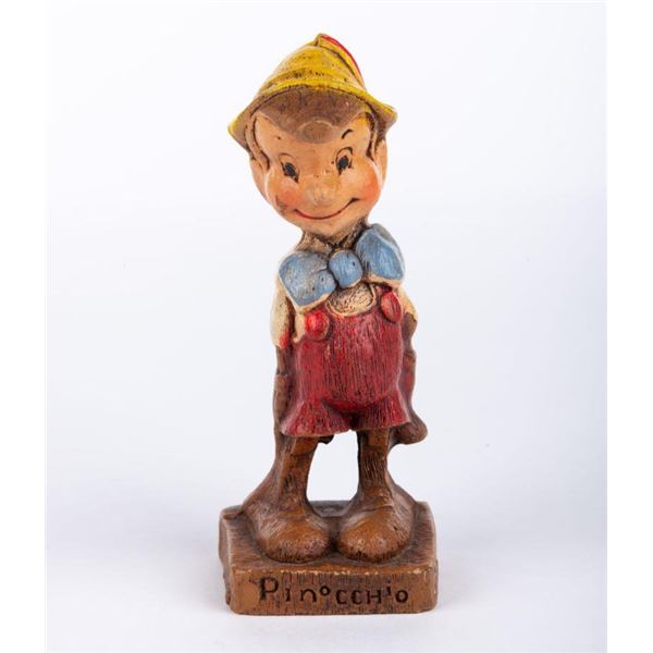 A Pinocchio Figurine by Multi Products of Chicago.