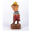 Image 1 : A Pinocchio Figurine by Multi Products of Chicago.