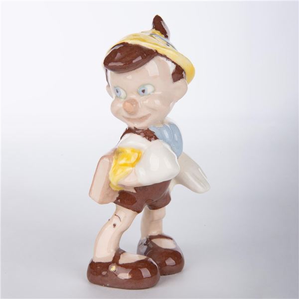 A Pinocchio Ceramic Figurine.