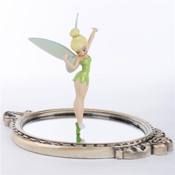 A WDCC "Tinker Bell Pauses to Reflect" Figurine.