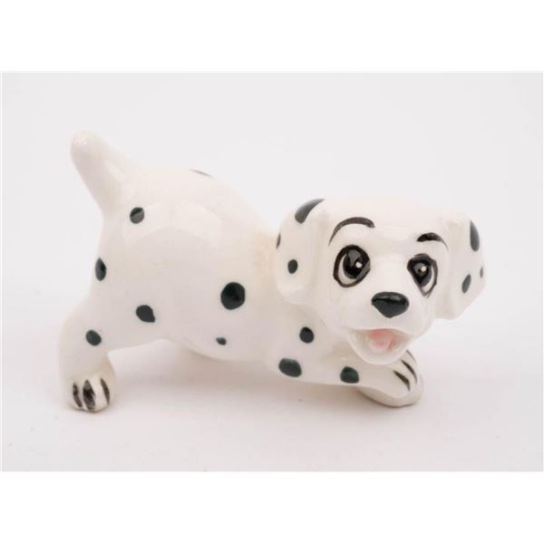 A "One Hundred and One Dalmatians" Puppy Ceramic Figurine.