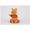 Image 1 : A Winnie the Pooh Ceramic Figurine by Enesco.