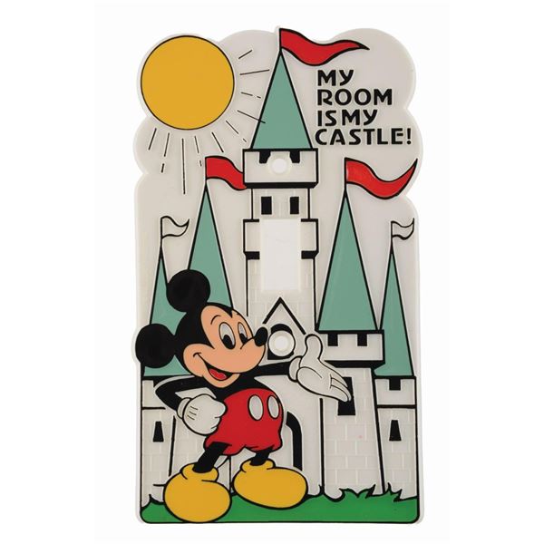 A Mickey Mouse and Castle Light-Switch Plate.