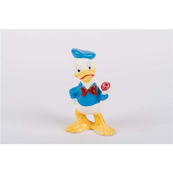 A Donald Duck Ceramic Figurine.