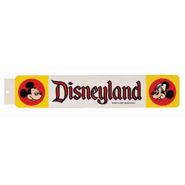 A Disneyland Bumper Sticker with Mickey and Minnie.